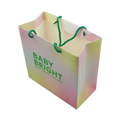 شراء أكياس ورقية للتسوق بوزن 80-350 جرامًا بمقبض للفساتين والطعام مع نمط شعار مطبوع online manufacture
